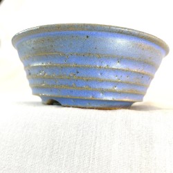 Small round accent bonsai pot in blue stoneware with yellowish highlights and ribbed