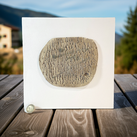 Handmade abstract stoneware ceramic wall mural with textured relief mounted on wood