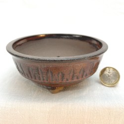 Maceta redonda para bonsai en gres esmalte rojo tenmoku con listas grabadas a mano por Ismael Garcia Burillo SKU 11TEMPORAL